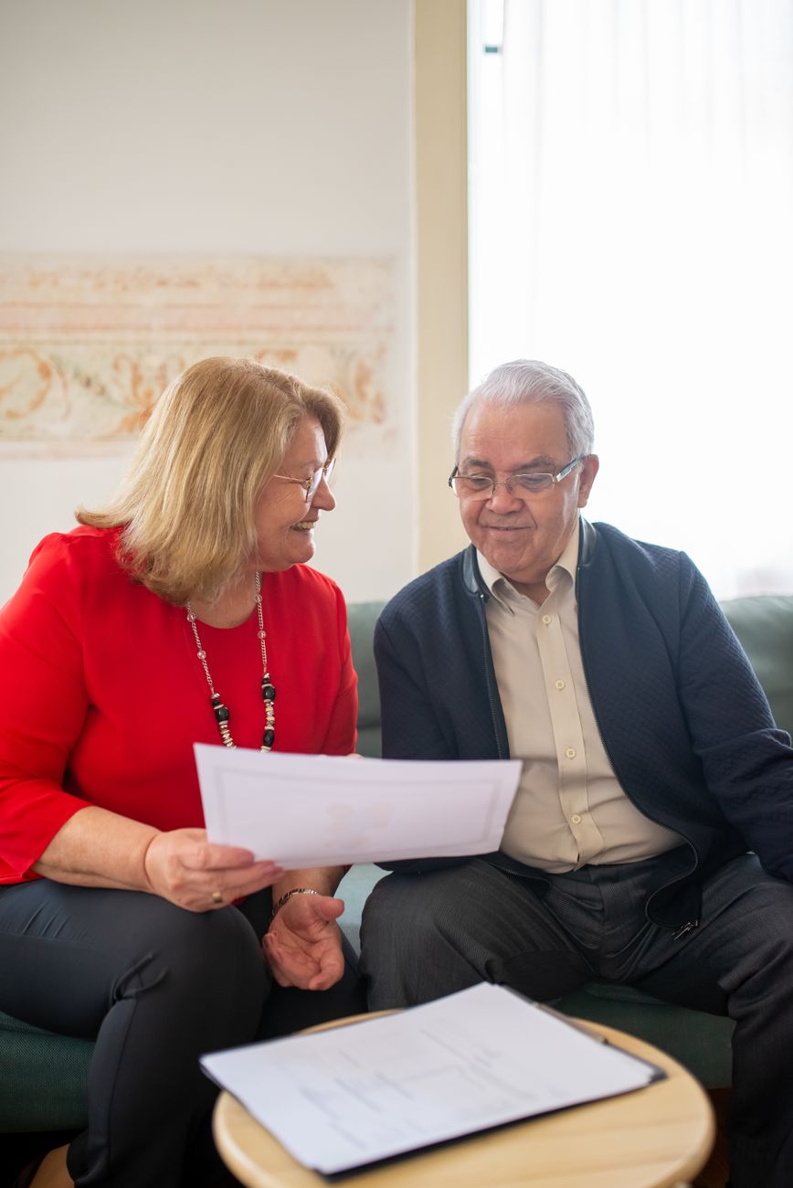 Couple happily modeling retirement plan